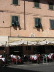 A sidewalk restaurant - interesting shutters