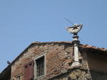 house with sun dial
