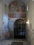 S.Agnese fuori le Mura:  The glass door into the basilca at the bottom of the stairway
