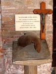 S.Lorenzo: cloister -- WW II bomb fragment